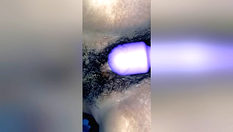 Hairy Indian babe with nice face plays with a dildo