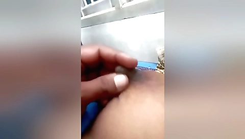 Indian brunette 18+ showing off her body in the bedroom