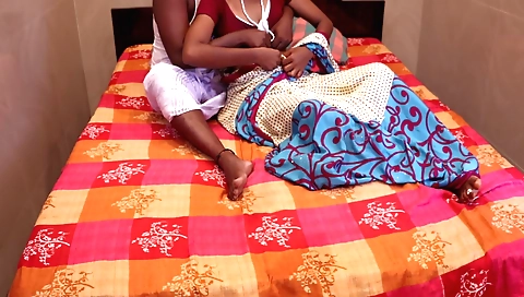 Couple with a great body making out in a private room