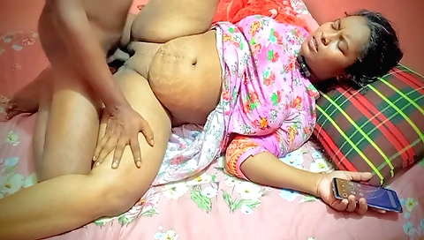 Indian teen girl is talking on the phone to her husband