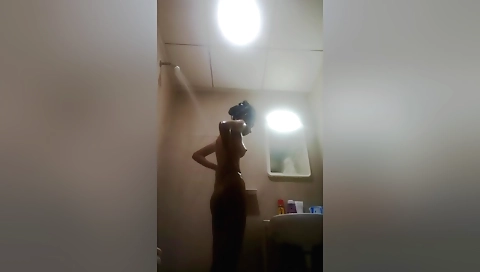 Indian brunette naked in the shower with the camera