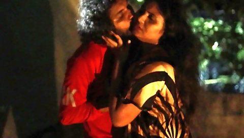 Girl is out on the terrace and she is making out with her friend