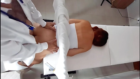 Red-haired amateur woman is fucking with a plastic rod