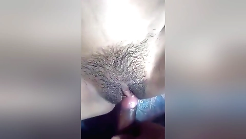 Hairy indian girl getting penetrated with black toy