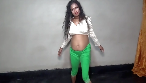 Indian brunette model girl with a sexy dancing performance