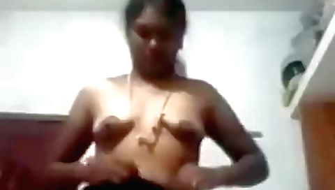Indian brunette naked stripping in front of the camera