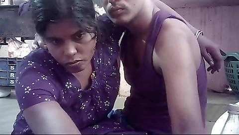 Indian wife caresses her husband's big cock on the couch