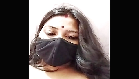 Indian bhabi with large tits spreads her legs and gets licked