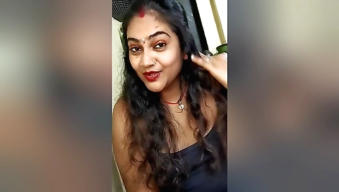 Busty Indian slut in skimpy lingerie shows her ass and body
