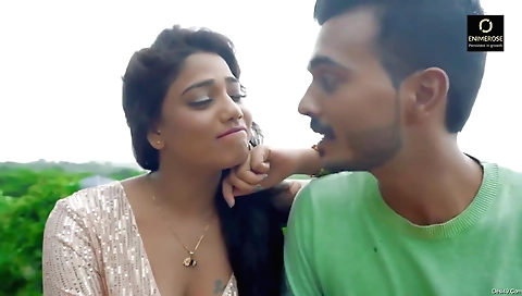 Hot brunette with a nice face is playing with her headphones