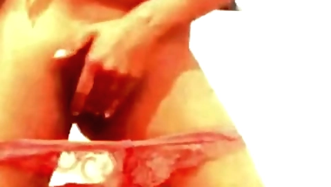 Amateur brunette in red bikini dances with her body