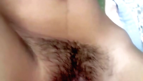 Busty brunette with a round ass and hairy pussy is fucked