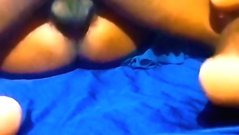 Indian wife in sexy black shorts filming on webcam