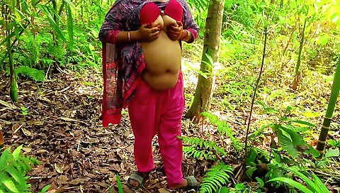 Brunette in a jungle gets her ass fucked hard by a guy