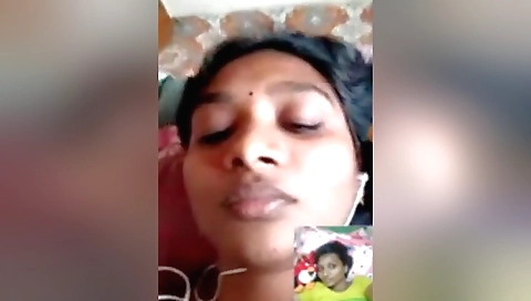 Sexy brunette with a red dress is showing her boobs