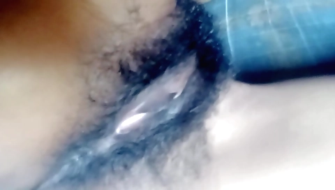 Indian hairy naked in her bedroom with her hairy pussy