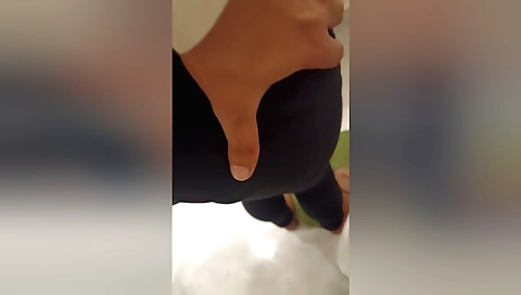 Indian beauty in a tight black dress and a pantyhose