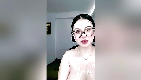 Hot brunette naked in the kitchen with her lips exposed