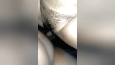 Indian babe gets her hairy pussy filled up with a dildo