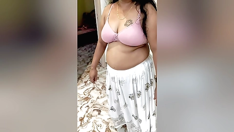 Indian chick is playing with her big tits and hands