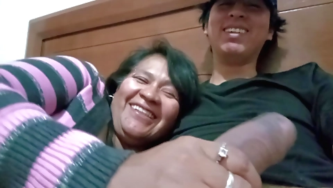 Indian mature in black tshirt and white shorts sucking his cock