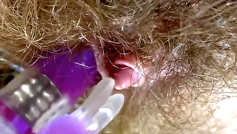 hairy girl with big boobs enjoys playing with her big toy