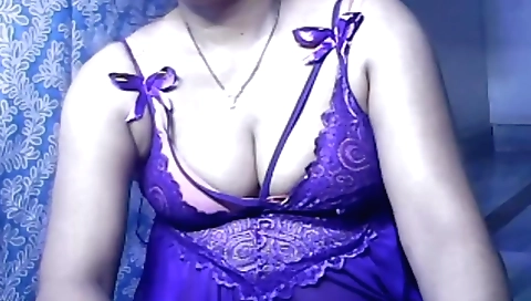 Horny girl in a sexy dress and white blouse masturbates