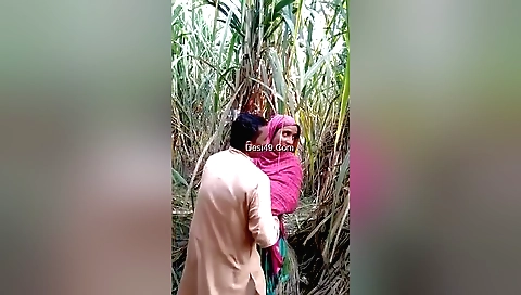 A brunette is fucking outdoors on her back in outdoor video